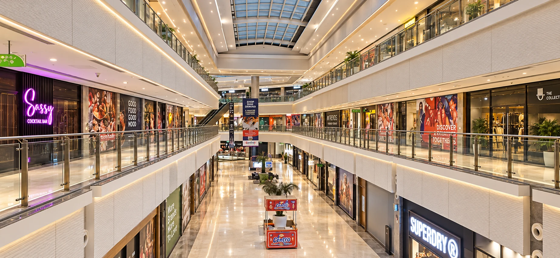 Long view through a shopping mall with retail galleries on several levels