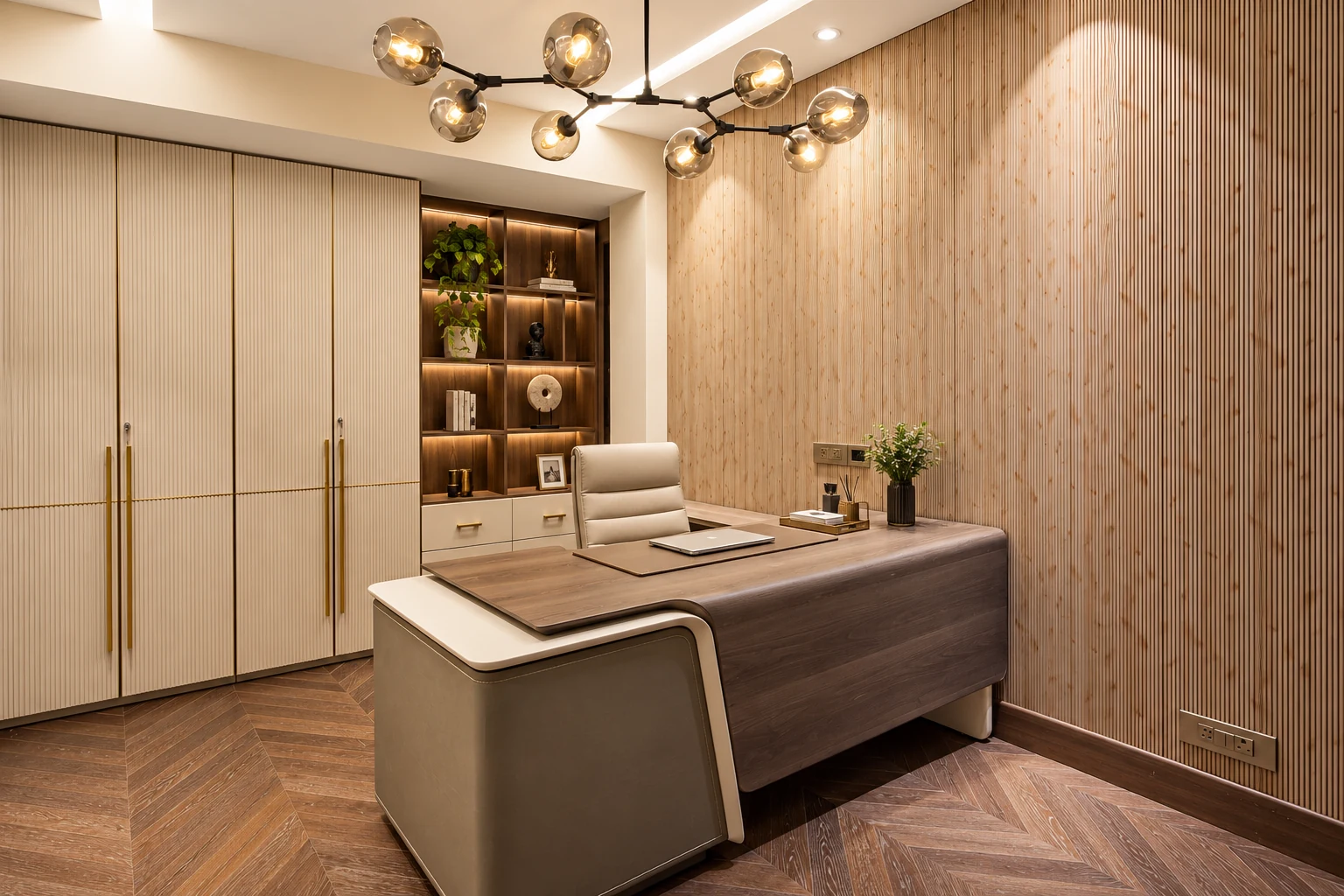 Study with a writing desk, fitted cabinetry and illuminated shelving